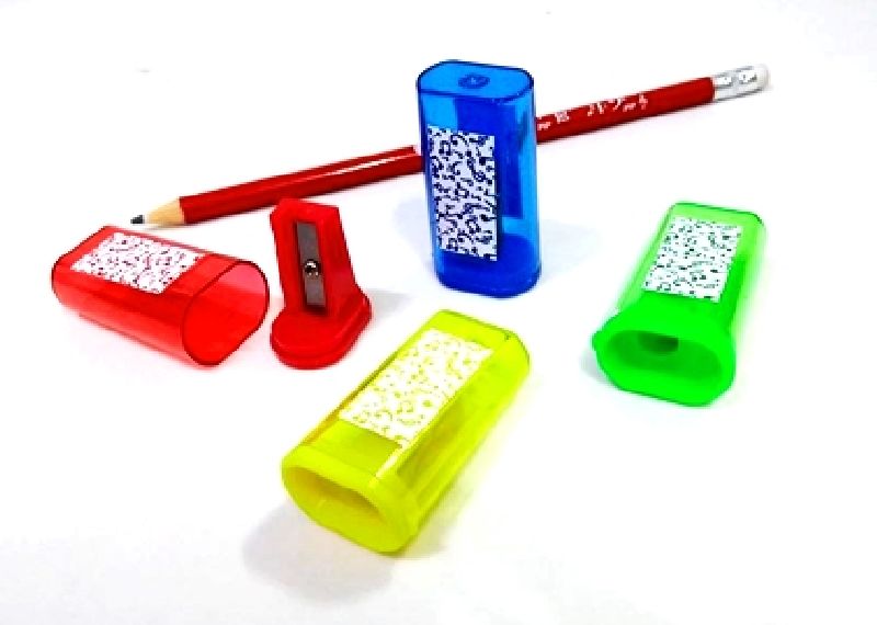 Apontador de lapis com deposito decorado notas musicais cores variadas 